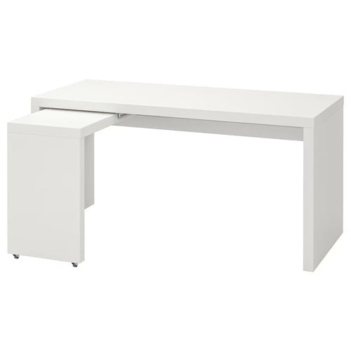 white IKEA Malm desk with pull-out panel